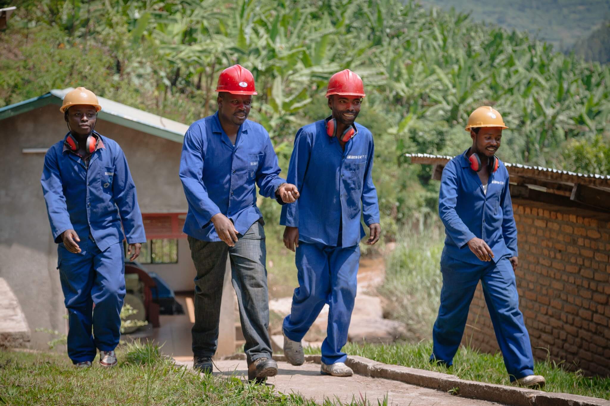 Thanol field workers in safety gear, Tanzania